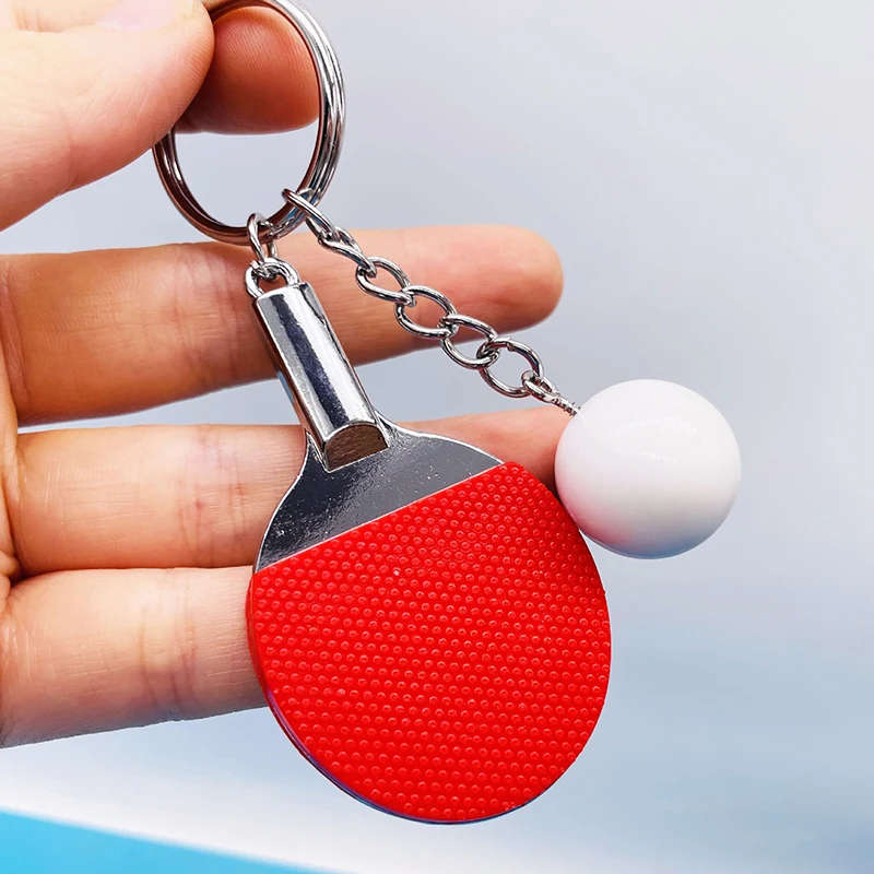 7色の可愛い卓球ラケット型ペンダント。お土産や卓球ボールのキ - Table Tennis Olympics のレビューと価格